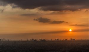 Preview wallpaper sunset, sun, city, sky