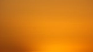 Preview wallpaper sunset, sun, clouds, horizon, glow