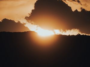 Preview wallpaper sunset, sun, clouds, light, dusk
