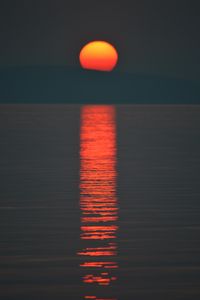 Preview wallpaper sunset, sun, dark, water, reflection