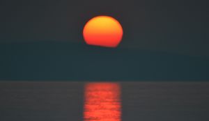 Preview wallpaper sunset, sun, dark, water, reflection