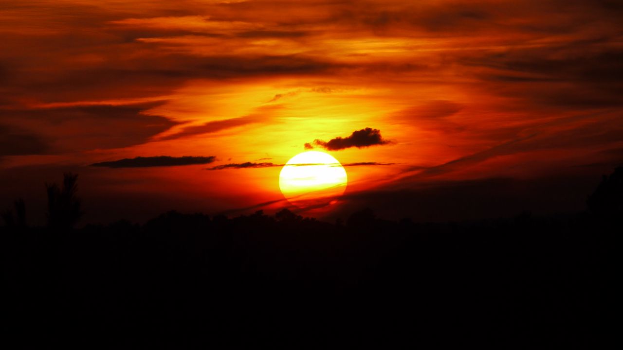 Wallpaper sunset, sun, dark, clouds