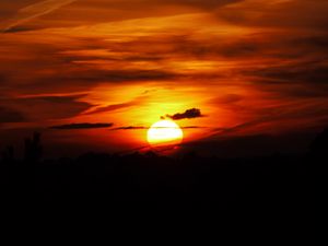 Preview wallpaper sunset, sun, dark, clouds