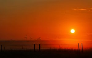 Preview wallpaper sunset, sun, dusk, field, landscape