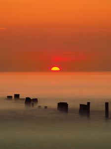 Preview wallpaper sunset, sun, fog, sea, horizon