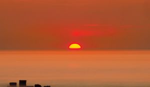 Preview wallpaper sunset, sun, fog, sea, horizon