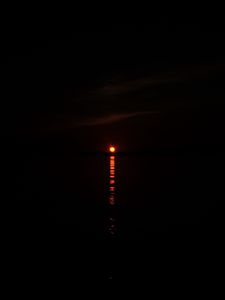 Preview wallpaper sunset, sun, glare, water, dark, horizon