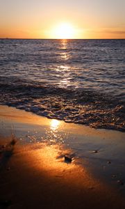 Preview wallpaper sunset, sun, glare, sea, horizon, water