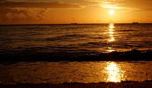 Preview wallpaper sunset, sun, glare, horizon, coast