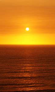 Preview wallpaper sunset, sun, glare, water, waves