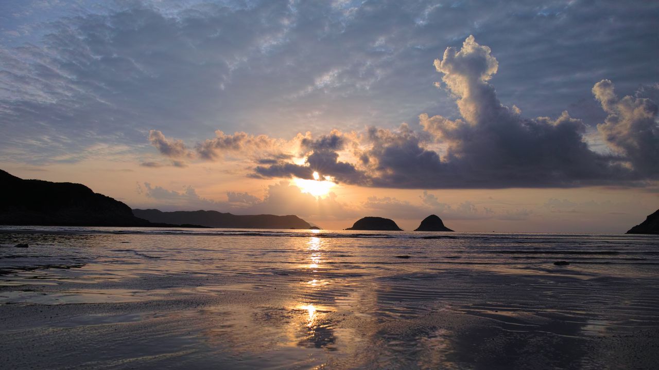 Wallpaper sunset, sun, glare, sea, clouds