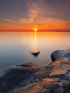 Preview wallpaper sunset, sun, horizon, stones, sky