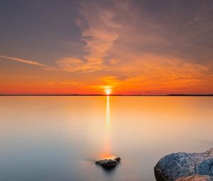 Preview wallpaper sunset, sun, horizon, stones, sky