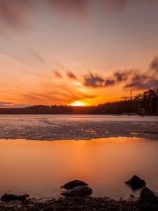 Preview wallpaper sunset, sun, lake, ice, stones
