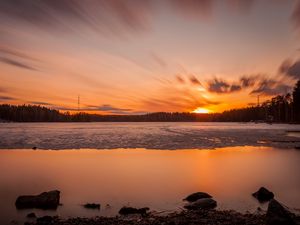 Preview wallpaper sunset, sun, lake, ice, stones