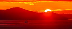 Preview wallpaper sunset, sun, mountains, sea, nature, red