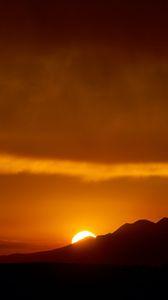 Preview wallpaper sunset, sun, mountains, silhouettes, dark