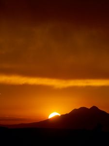 Preview wallpaper sunset, sun, mountains, silhouettes, dark