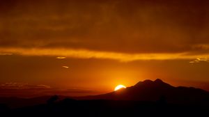 Preview wallpaper sunset, sun, mountains, silhouettes, dark