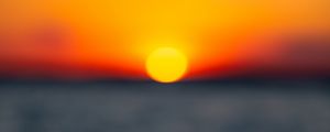 Preview wallpaper sunset, sun, sea, blur, horizon