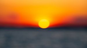 Preview wallpaper sunset, sun, sea, blur, horizon