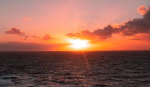 Preview wallpaper sunset, sun, sea, stones, horizon