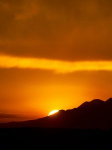 Preview wallpaper sunset, sun, slope, sky, clouds