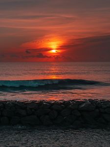 Preview wallpaper sunset, sun, stones, sea, waves