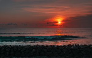 Preview wallpaper sunset, sun, stones, sea, waves