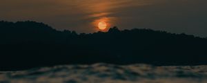 Preview wallpaper sunset, sun, trees, sea, blur