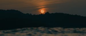 Preview wallpaper sunset, sun, trees, sea, blur