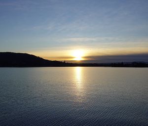 Preview wallpaper sunset, sun, water, reflection, dusk