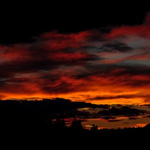 Preview wallpaper sunset, trees, clouds, silhouettes, dark, dusk