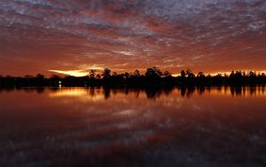 Preview wallpaper sunset, trees, water, reflection