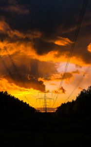 Preview wallpaper sunset, trees, wires, clouds