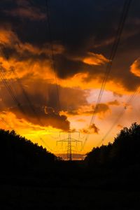 Preview wallpaper sunset, trees, wires, clouds