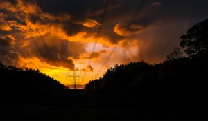 Preview wallpaper sunset, trees, wires, clouds