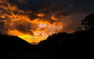 Preview wallpaper sunset, trees, wires, clouds