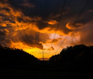 Preview wallpaper sunset, trees, wires, clouds