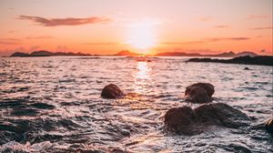 Preview wallpaper sunset, water, stones, waves, coast