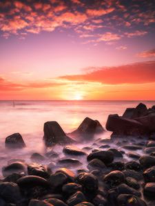 Preview wallpaper sunset, water, stones, fog