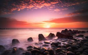 Preview wallpaper sunset, water, stones, fog