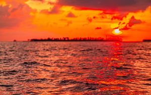 Preview wallpaper sunset, water, waves, dusk, red