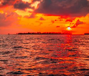 Preview wallpaper sunset, water, waves, dusk, red