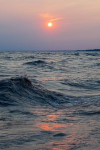 Preview wallpaper sunset, waves, horizon, glare, wavy