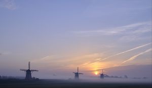 Preview wallpaper sunset, windmills, fog, dusk, landscape