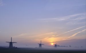 Preview wallpaper sunset, windmills, fog, dusk, landscape