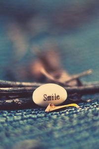 Preview wallpaper surface, metal, sticks, smile