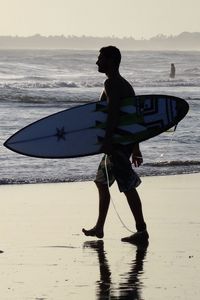 Preview wallpaper surfer, bali, beach, surfing