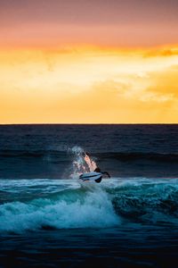 Preview wallpaper surfer, surfing, wave, horizon, sunset